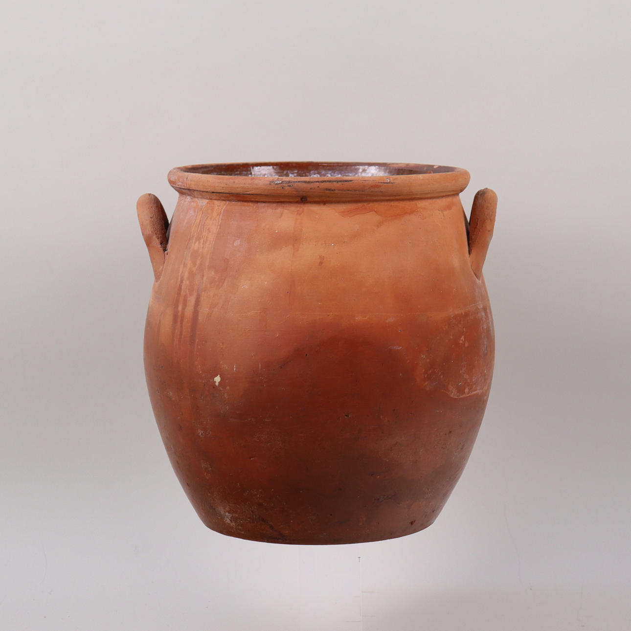 An earthenware mug, 19th century, inside glazed.