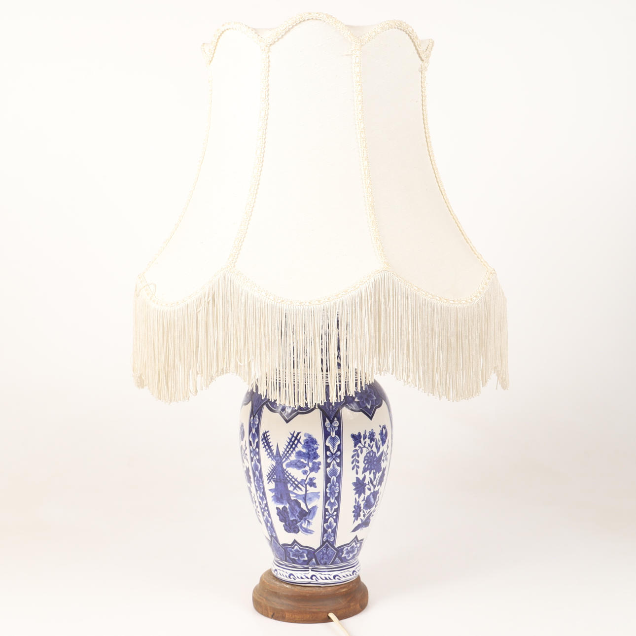 A table lamp, porcelain with textile shade, 20th century.
