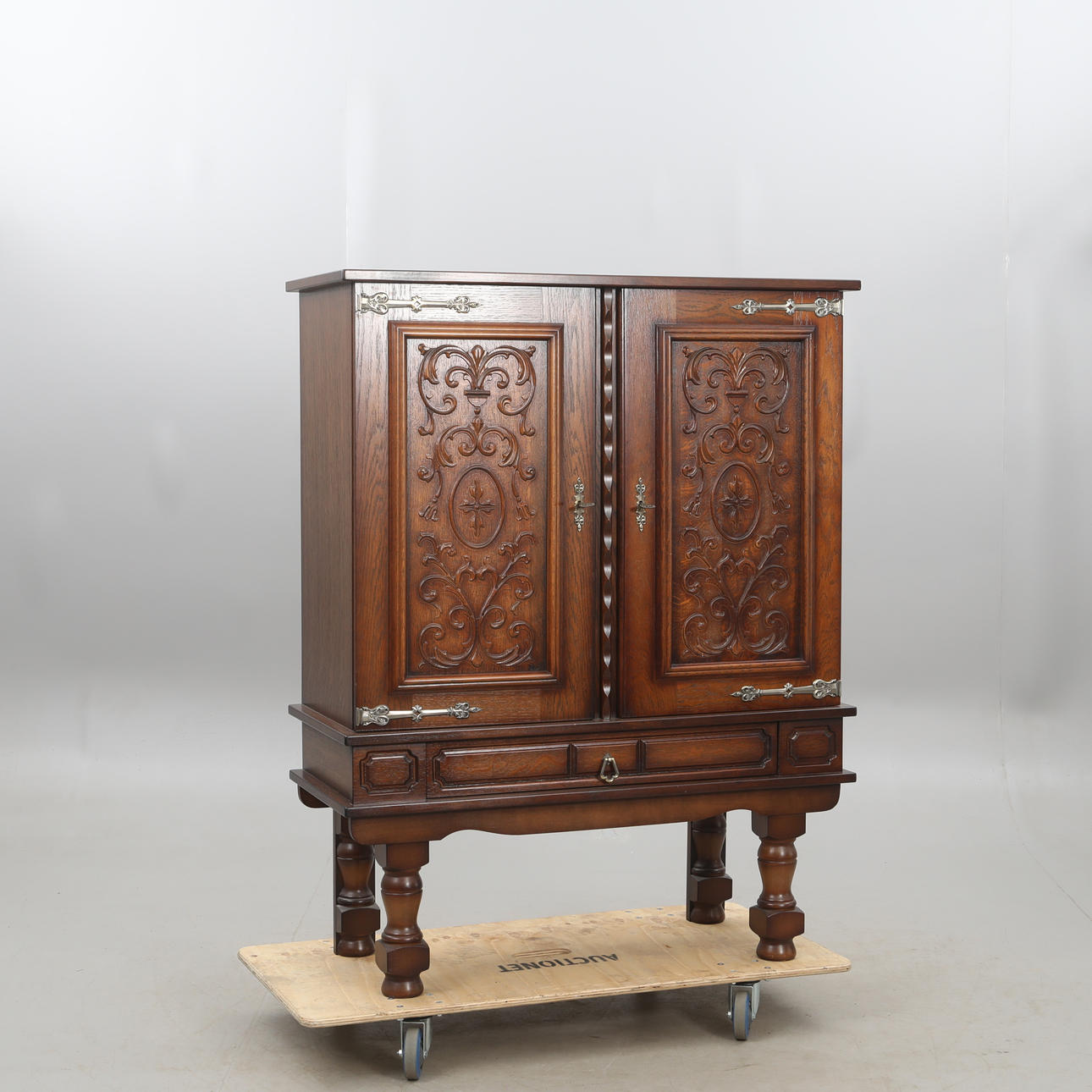 A cupboard, relief pattern, later part of the 20th century.