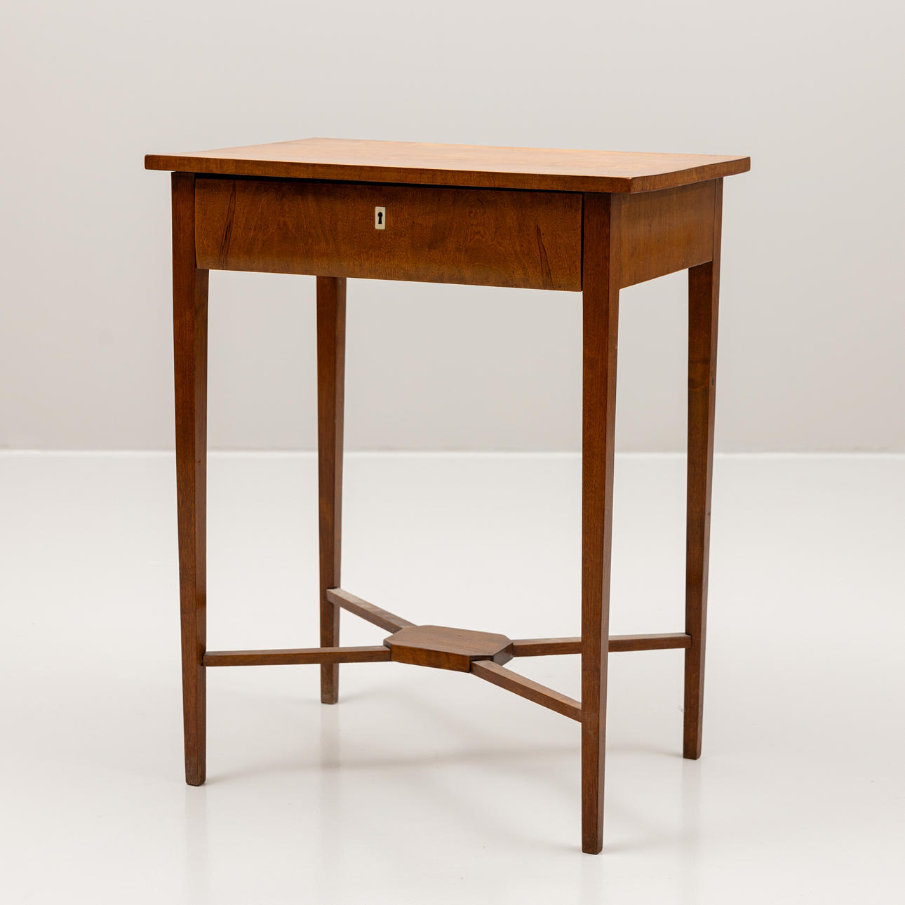 A 19th century birch side table with drawer.