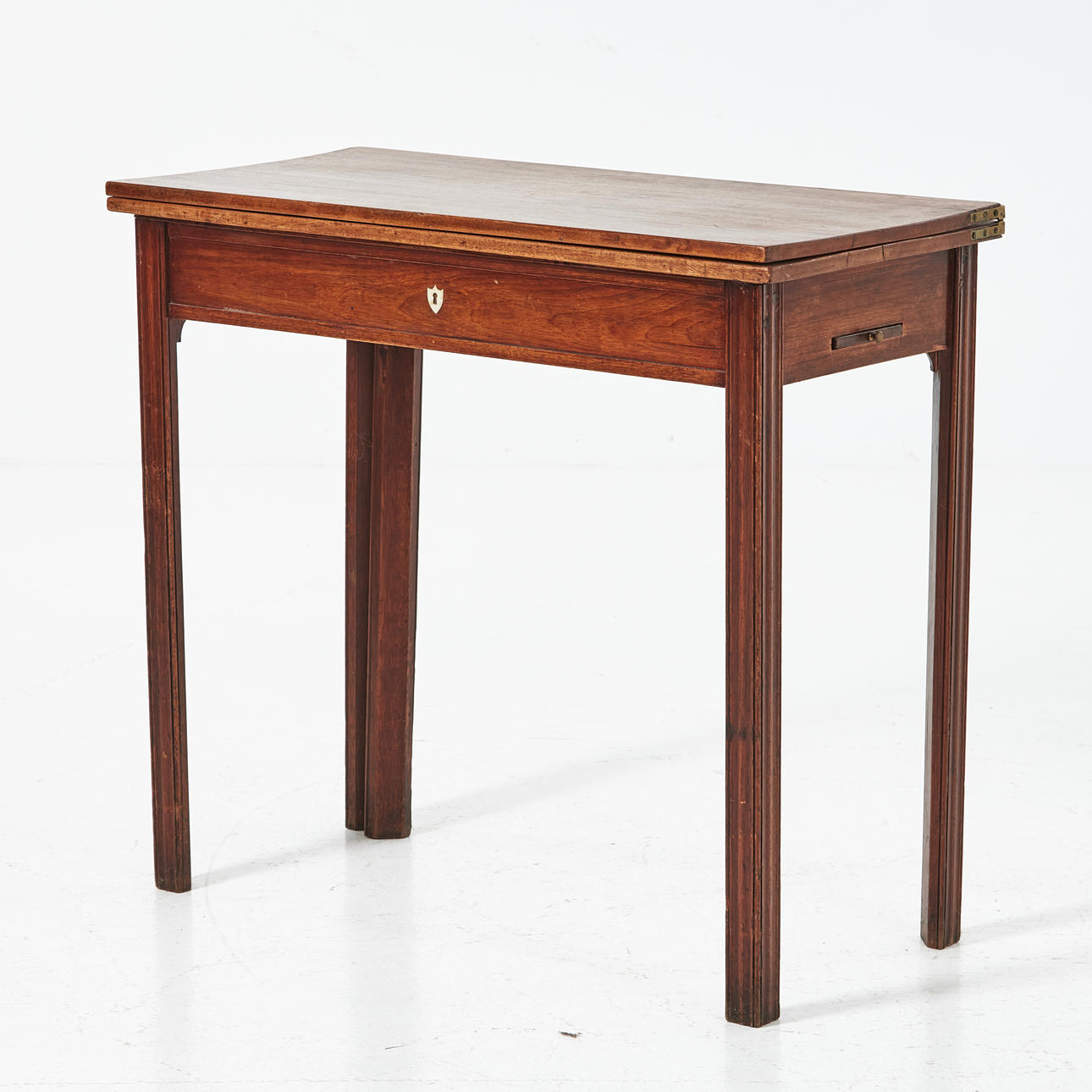 GAME TABLE, with decor, late Gustavian, veneered in mahogany, with extendable candle holders.