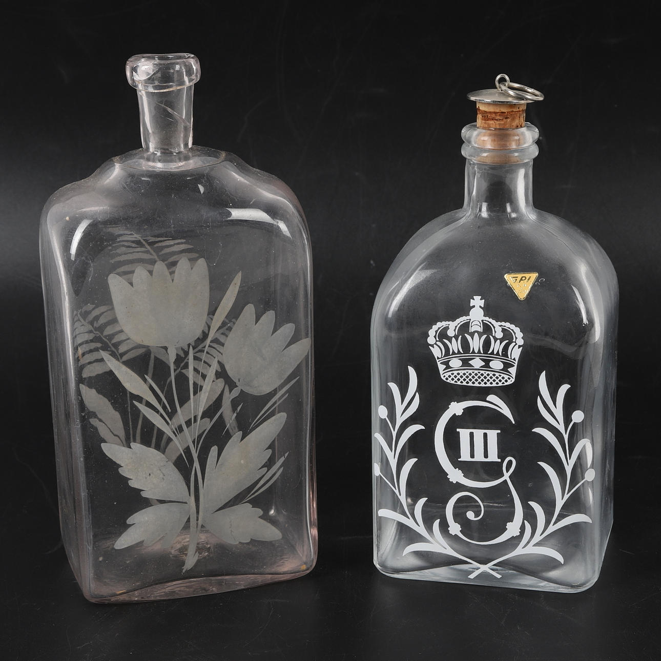Two glass decanters, 18th-20th century.