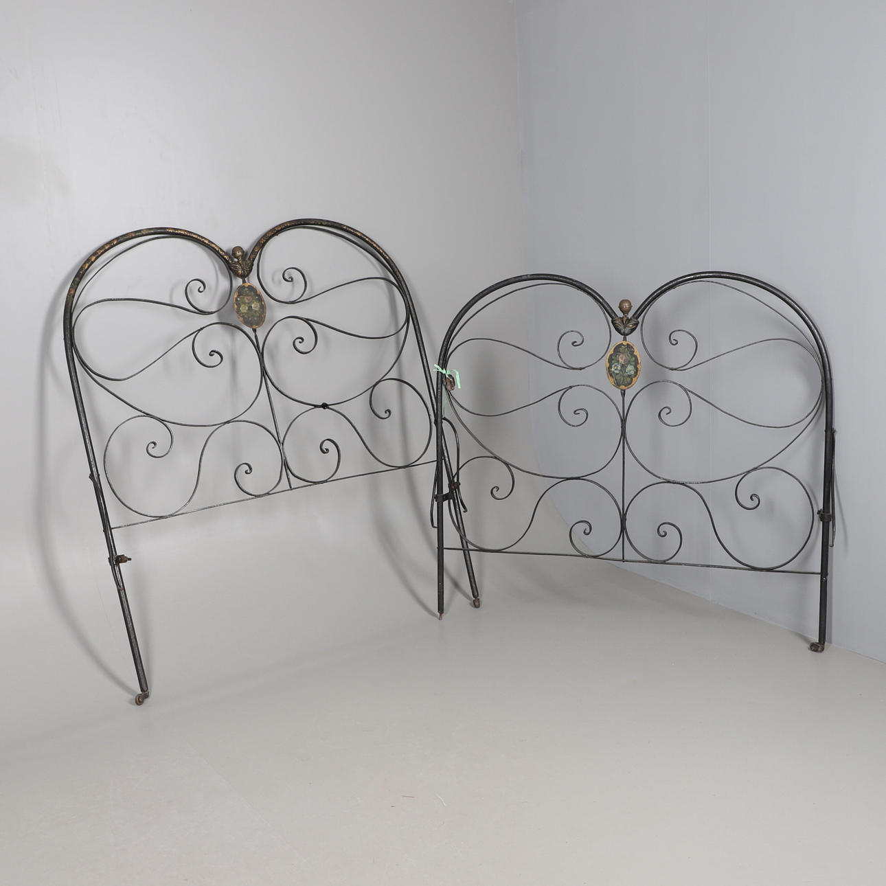 A PAIR OF SPANISH BED ENDS.