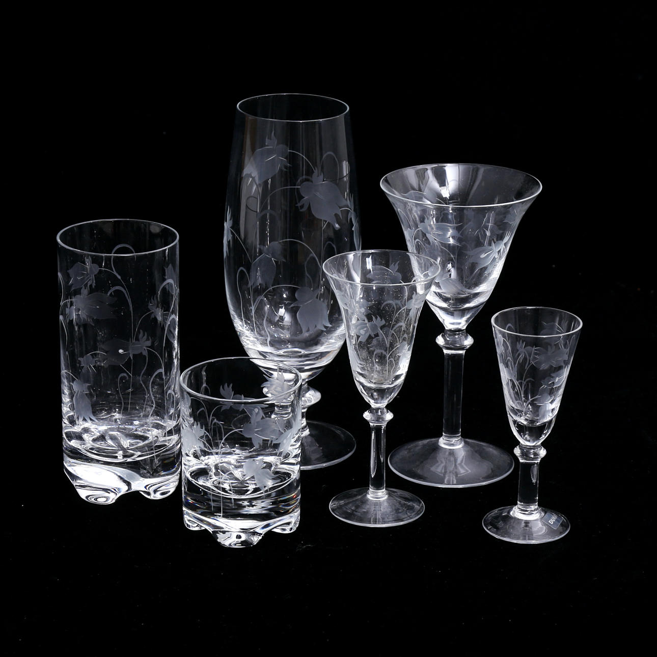 A 40-piece “Bluebell” glassware set, Tablecloth.