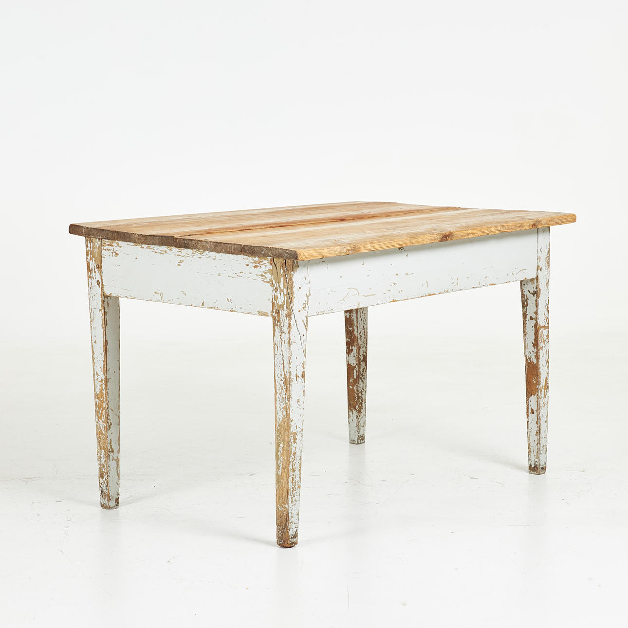 A 19th century table, pine, allmoge, painted underlay.