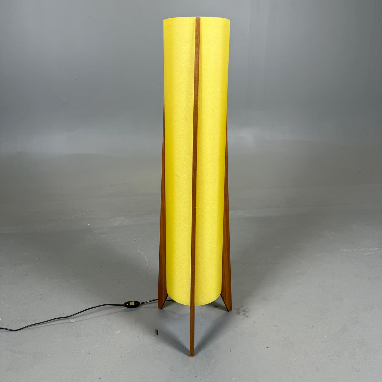 A teak floor lamp, mid 20th century.