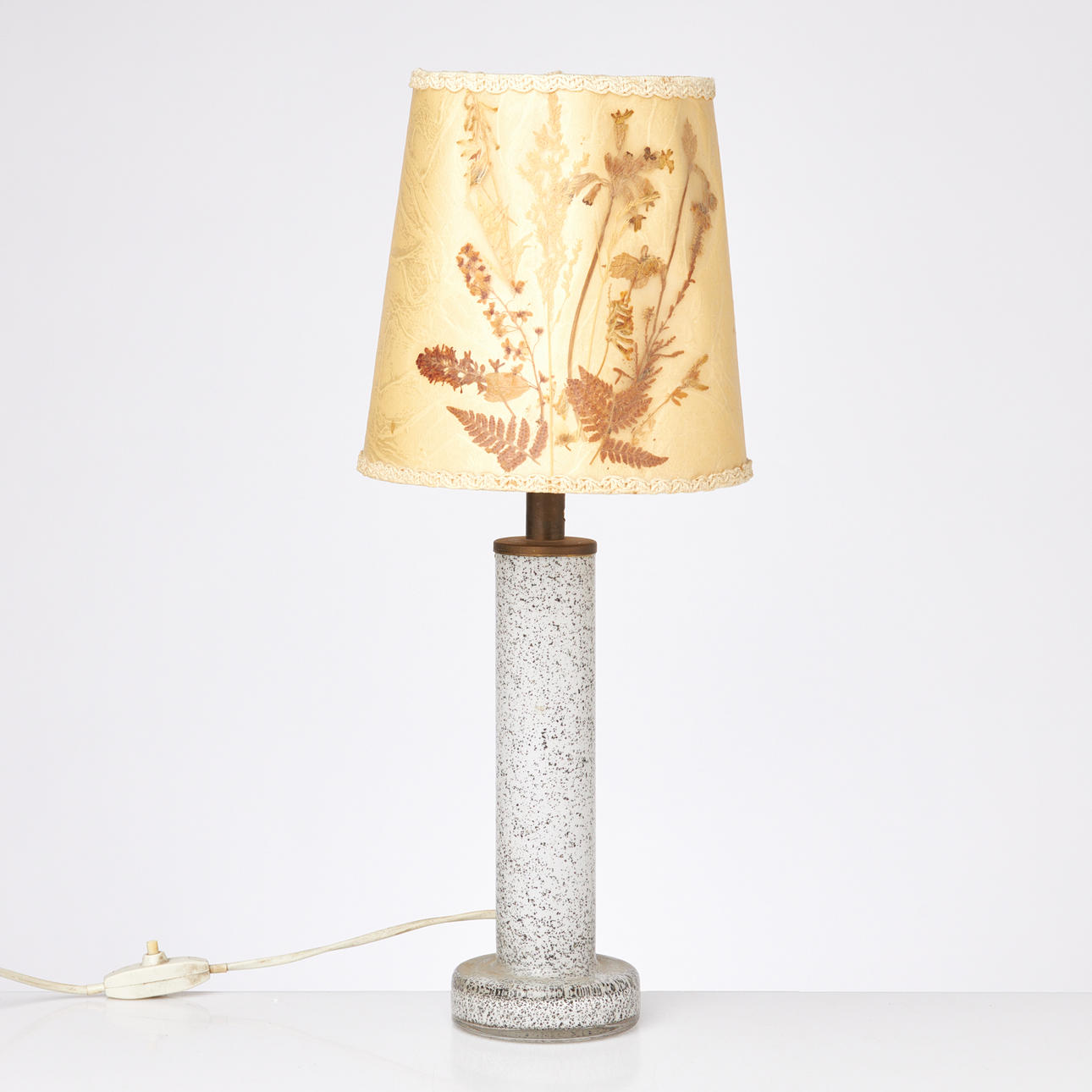 A table lamp, 20th century, frame in glass with decor in the underspan.