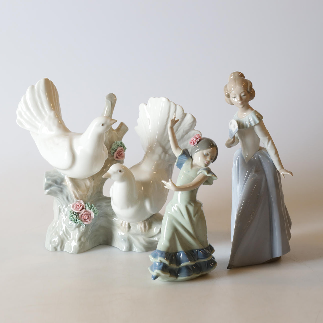Three porcelain figurines, Spain, 20th century.