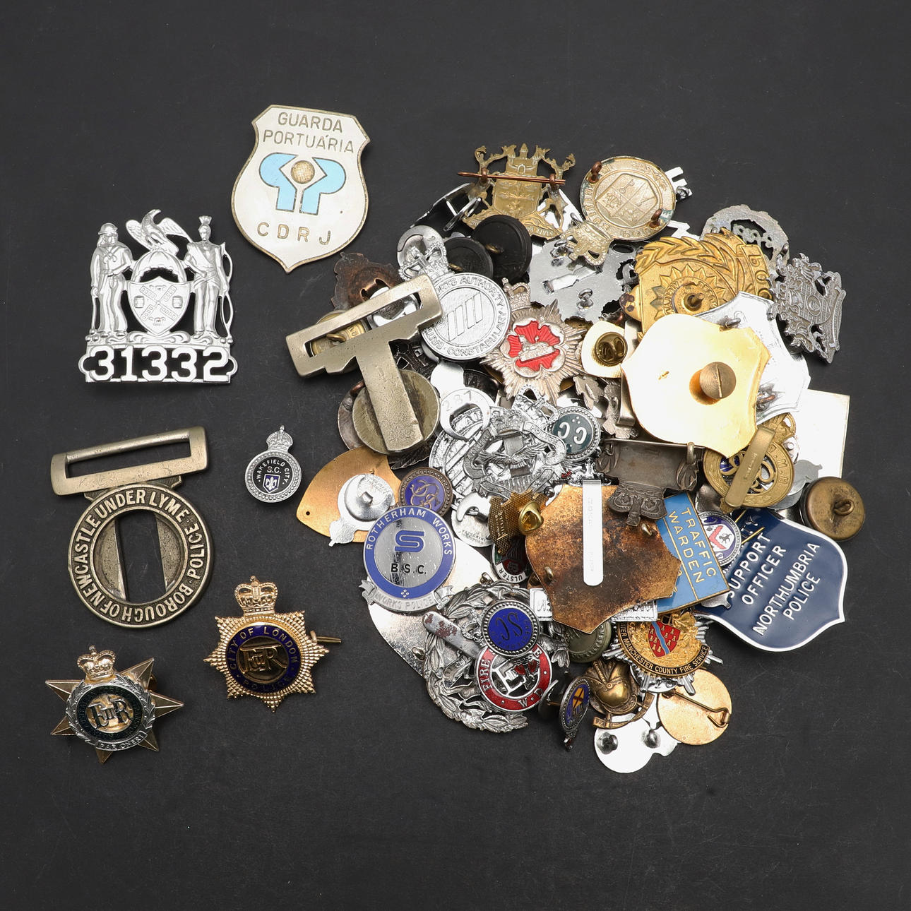 A COLLECTION OF ENAMELLED AND SIMILAR BADGES FOR POLICE FORCES AND ...