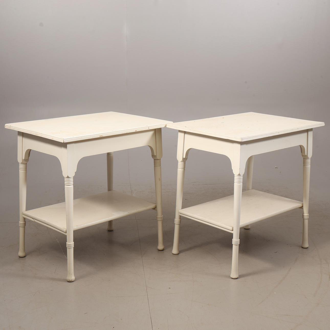 A pair of early 20th century table/window tables.