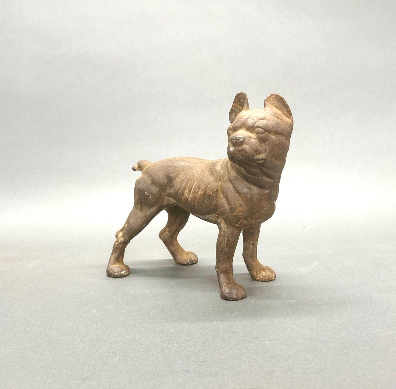CAST IRON DOG DOOR STOP.