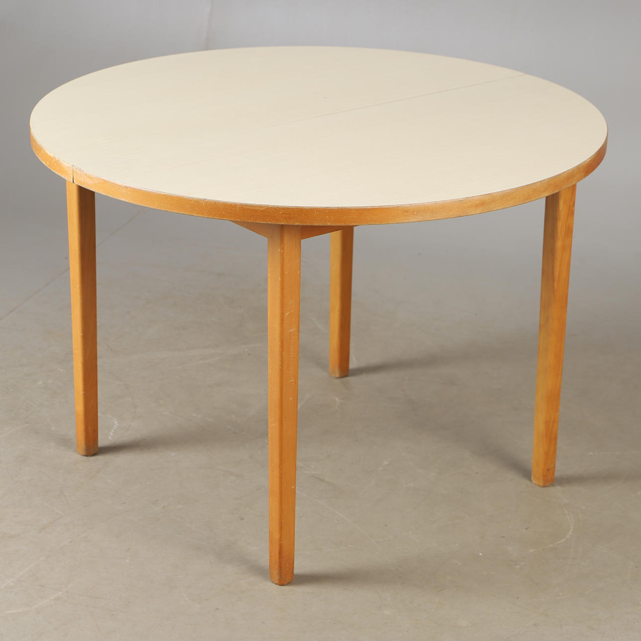 SIGVARD BERNADOTTE. Dining table with laminate top, mid 20th century.