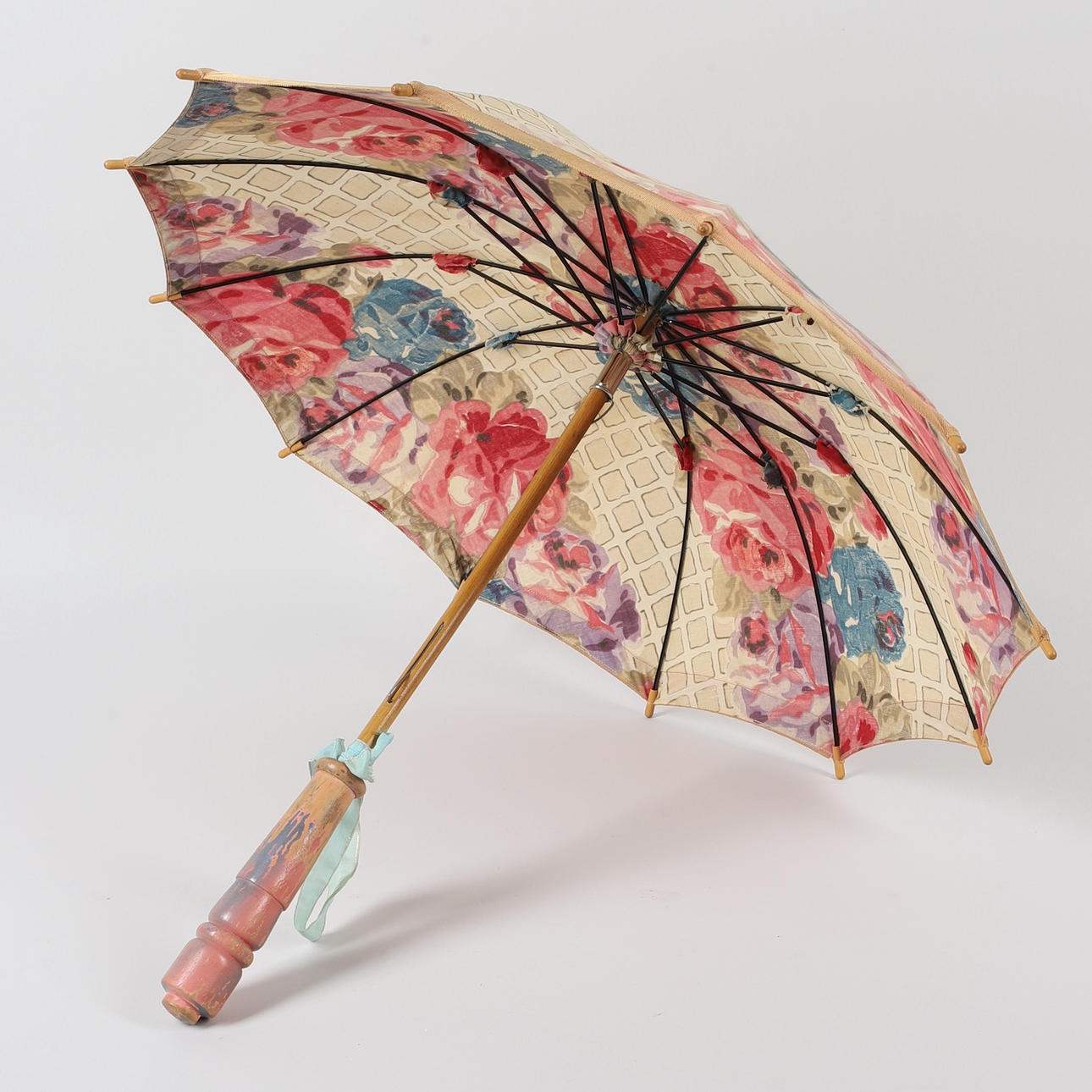A wooden & textile parasol, 1920s.