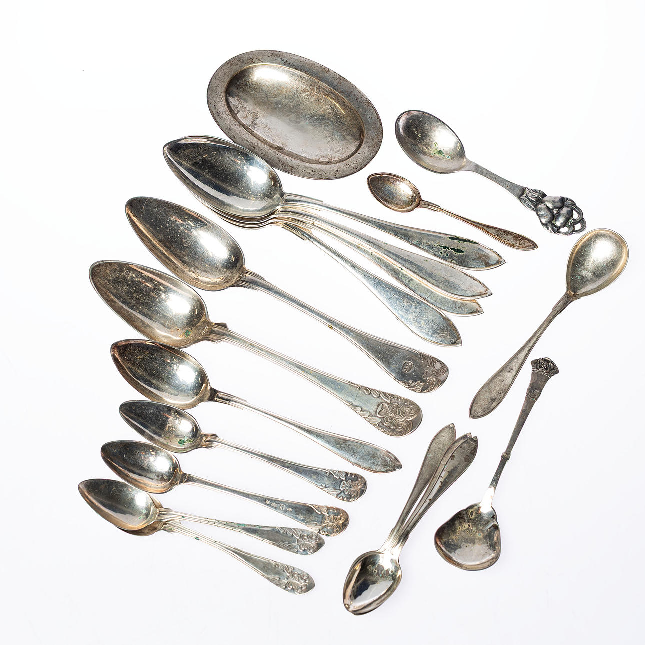 SILVER OBJECTS, a batch of spoons.