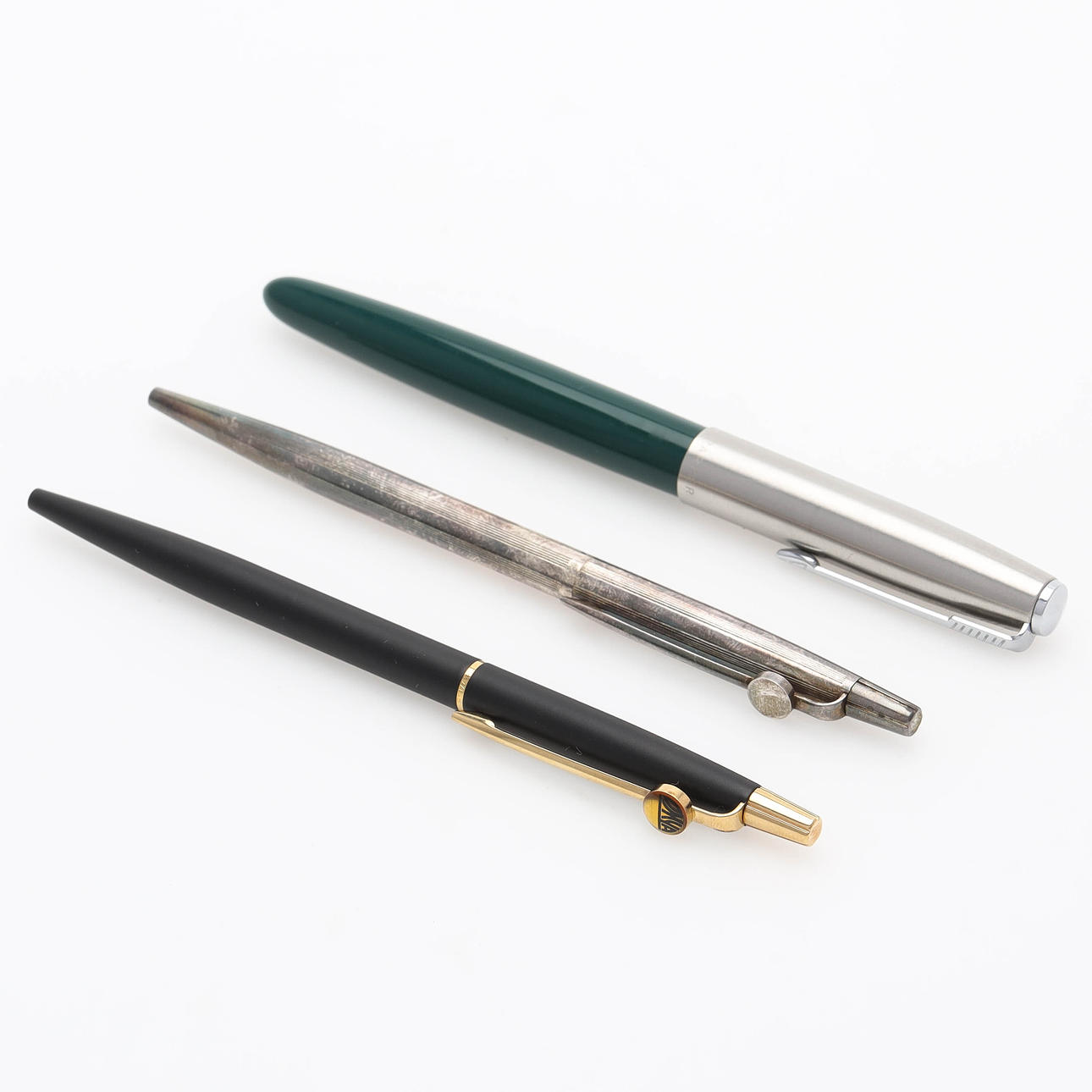 A set of 3 Parker and Caran d'Ache pencils, with cases.
