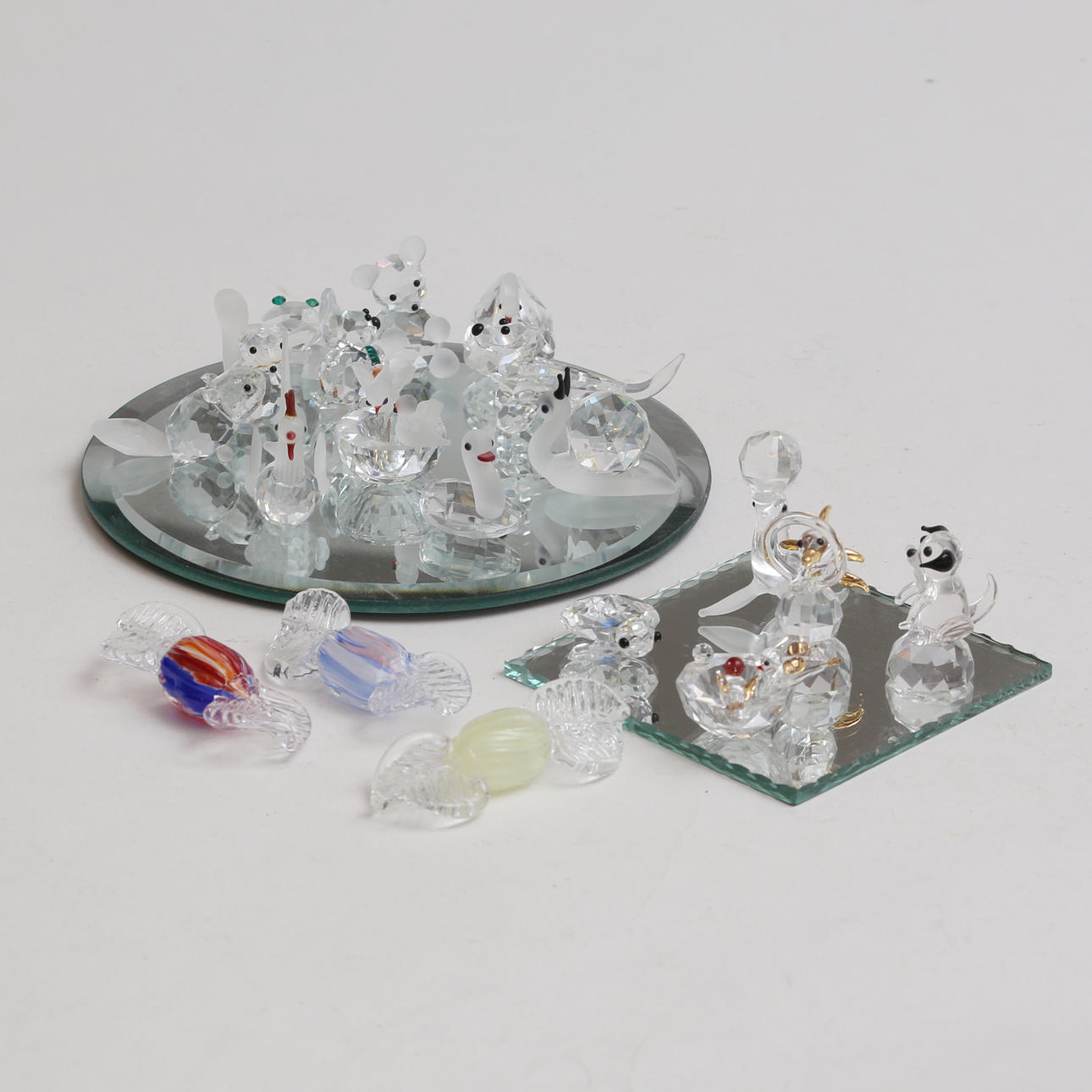 A set of 19 miniatures, mostly Swarowski.
