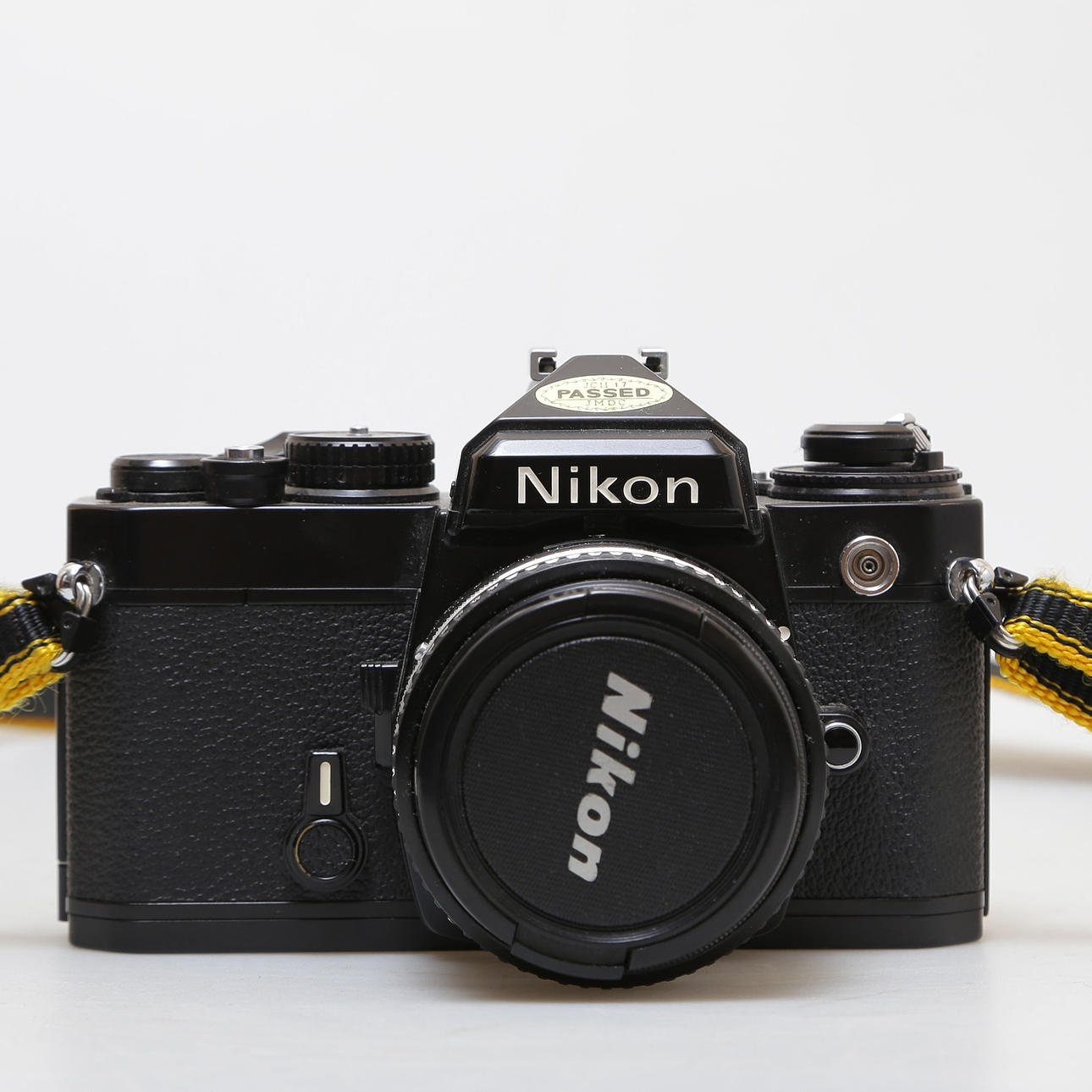 CAMERA, NIKON FE, NO 3967771, JAPAN.