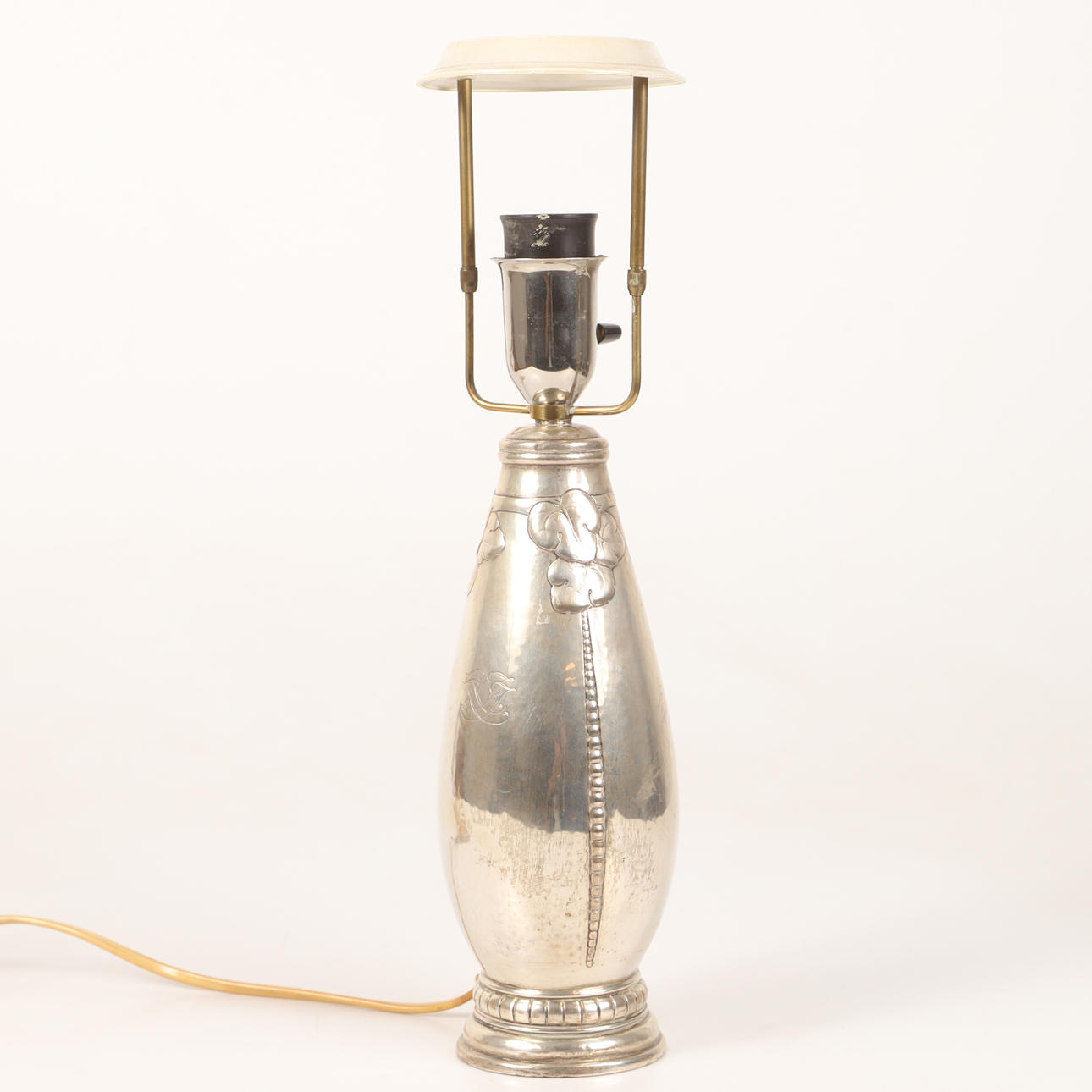A table lamp, silver, 1930s.