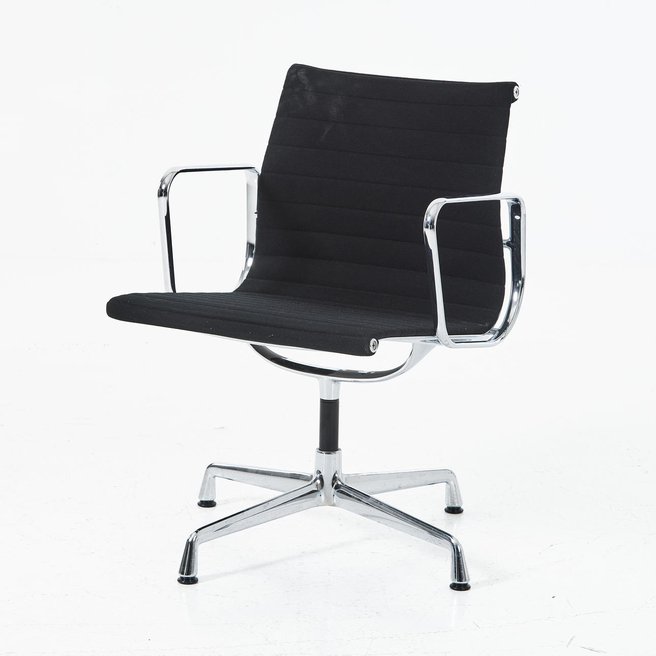CHARLES & RAY EAMES, an “EA 117" office chair.