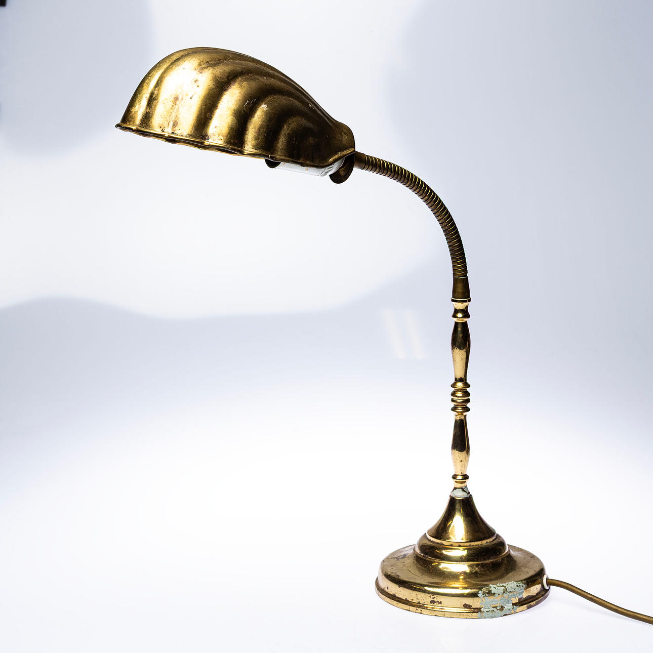 A brass “Ocean” seashell shaped table lamp, Texa, later part of the 20th century.