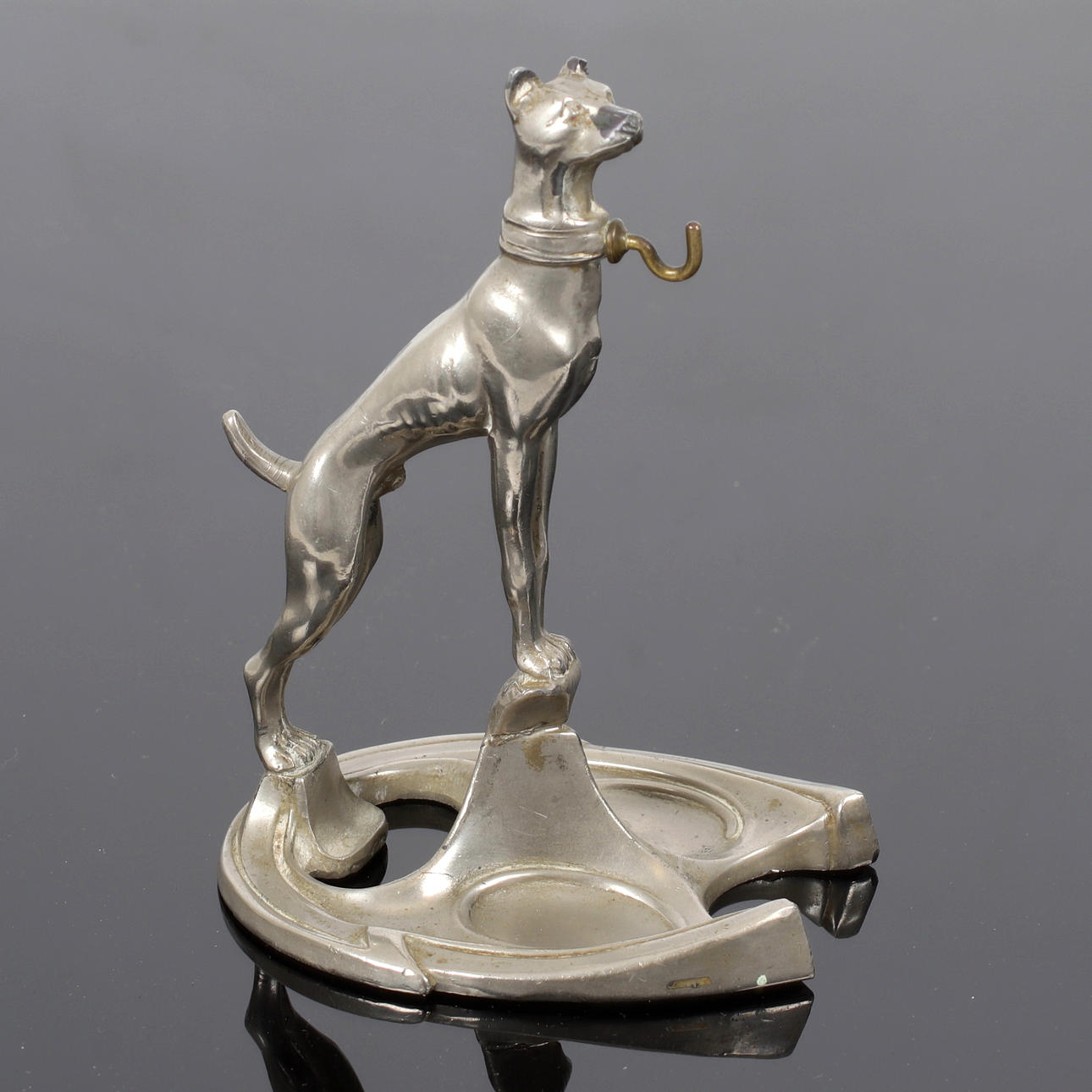 A pocket watch stand, vimetal, 18th/20th century.