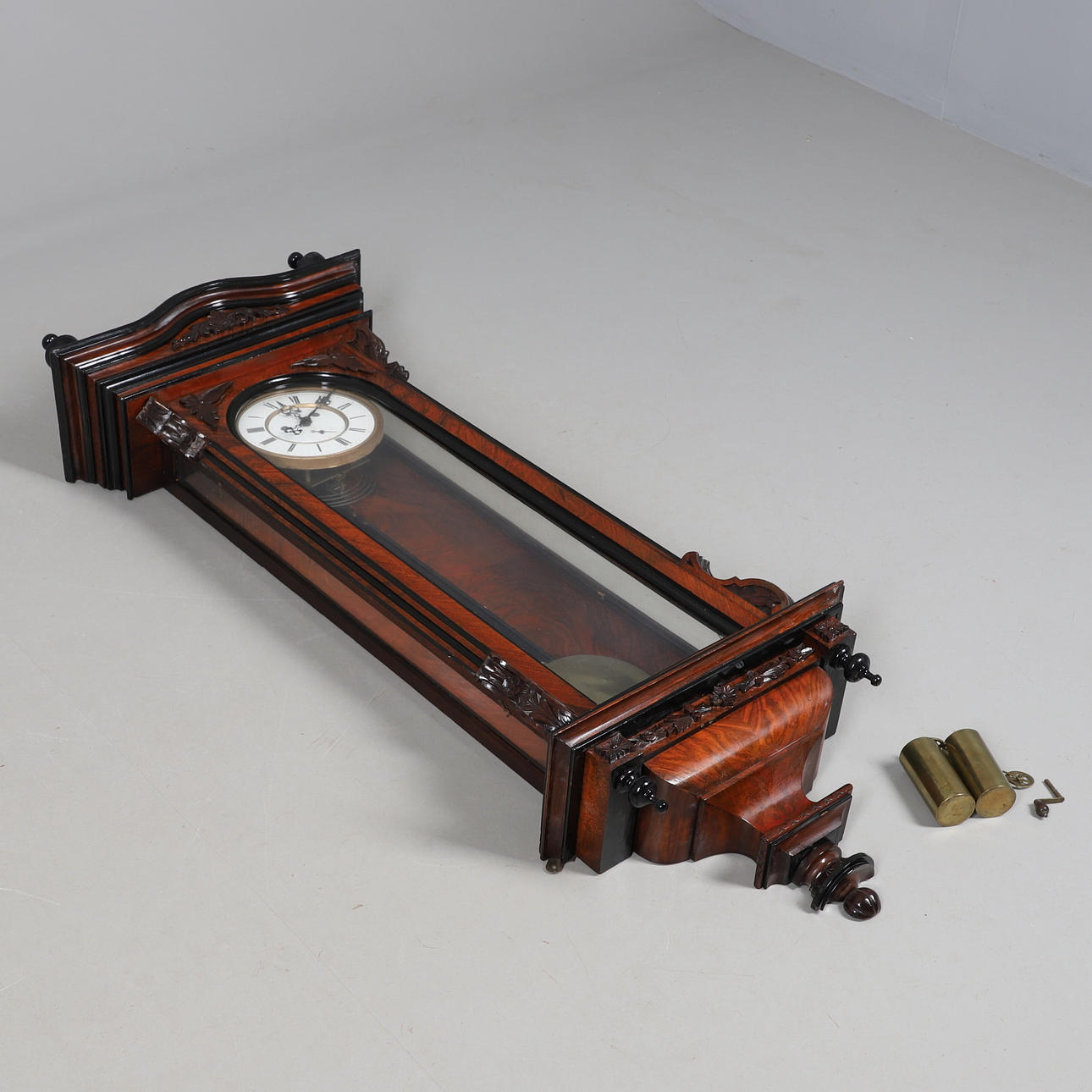 A VIENNA STYLE REGULATOR WALNUT AND EBONISED WALL CLOCK.