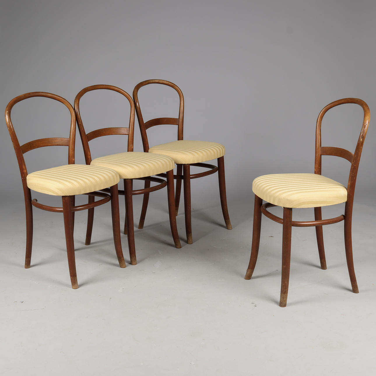 A set of stained moulded beech chairs with upholstered seat, Fritz Hansen, from the “Dan” series, Denmark, 1930/1940s (4).