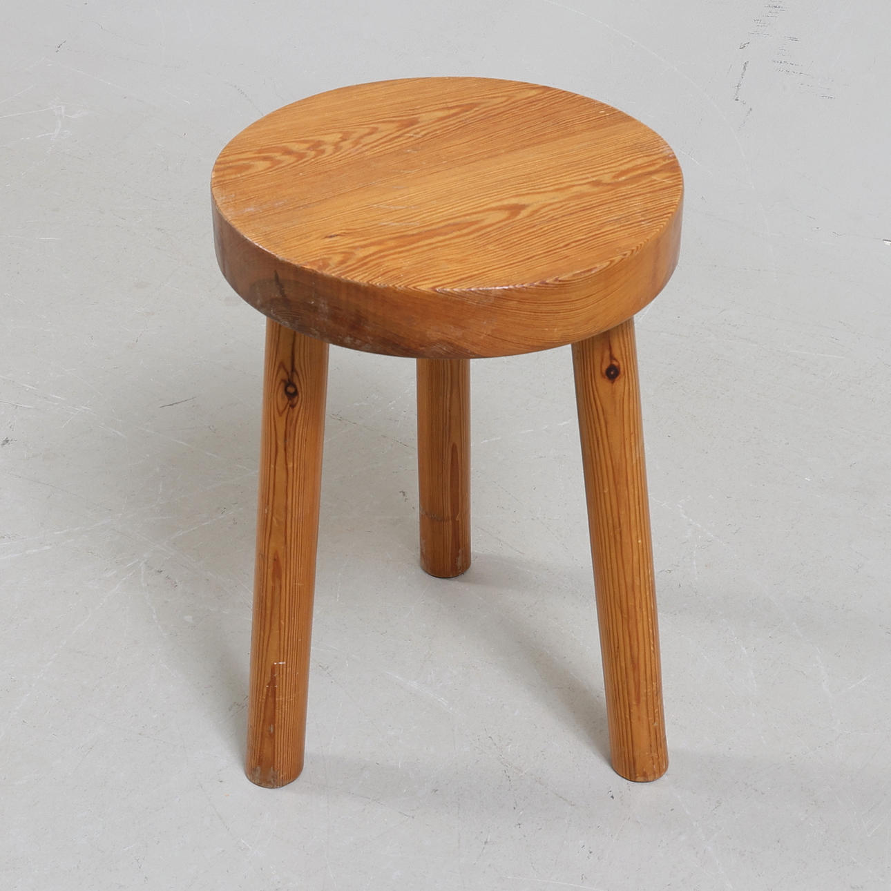 A 20th century pine stool.