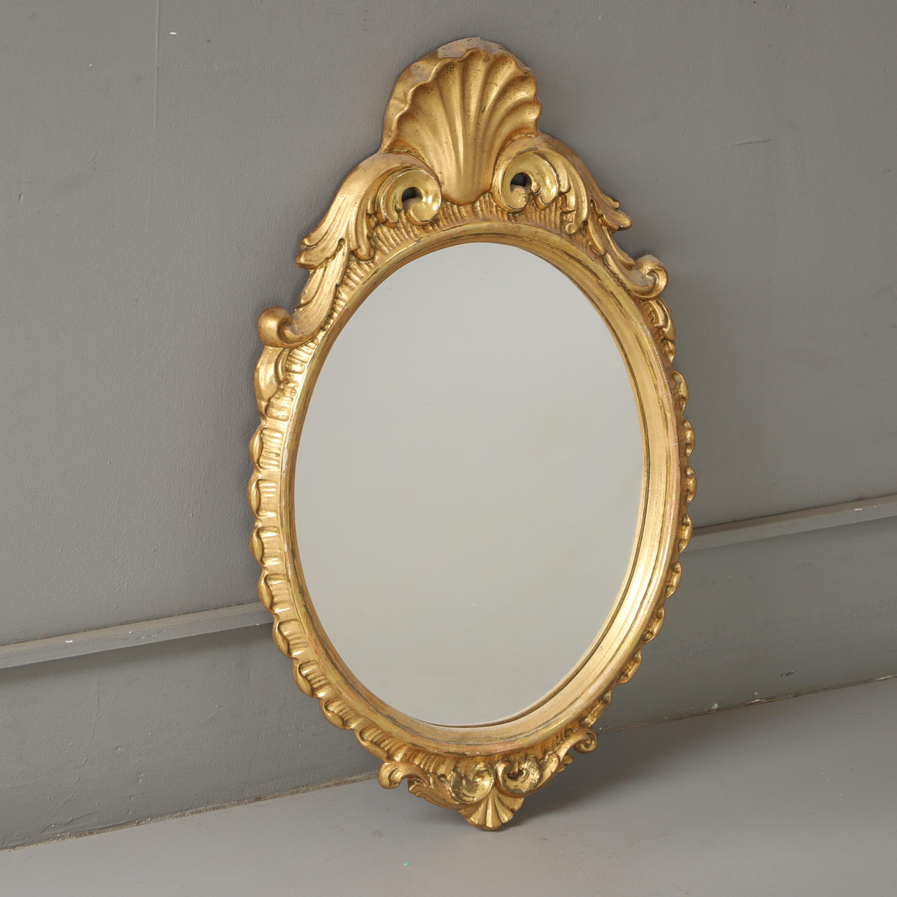 A 20th century gilt mirror.
