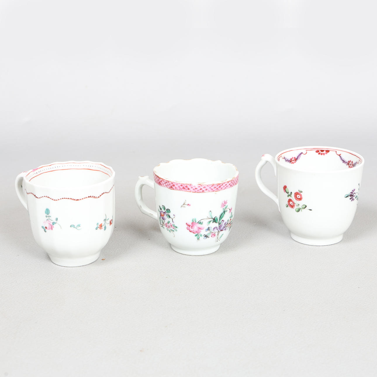 THREE NEWHALL PORCELAIN COFFEE CUPS (3).