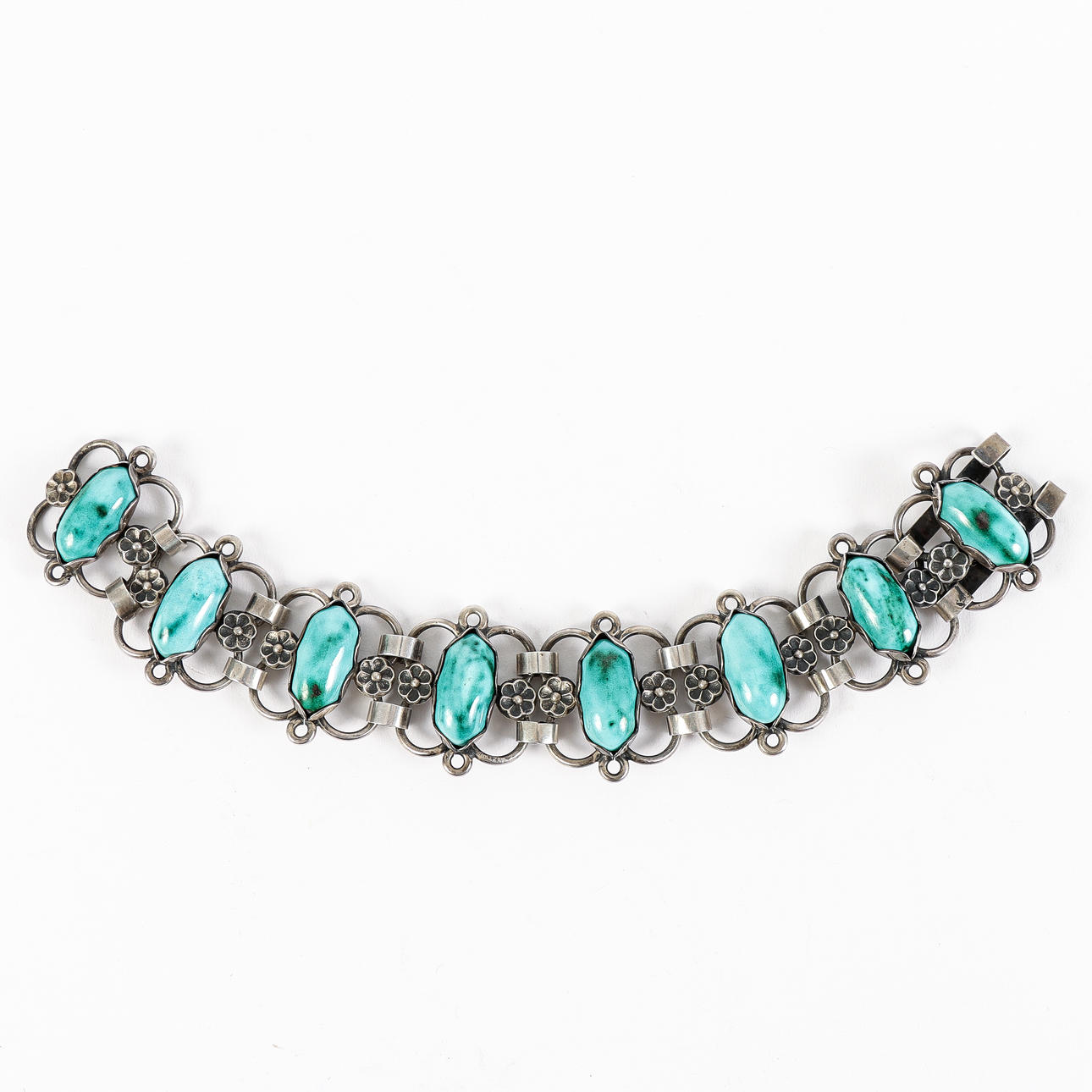 BRACELET silver with turquoises.