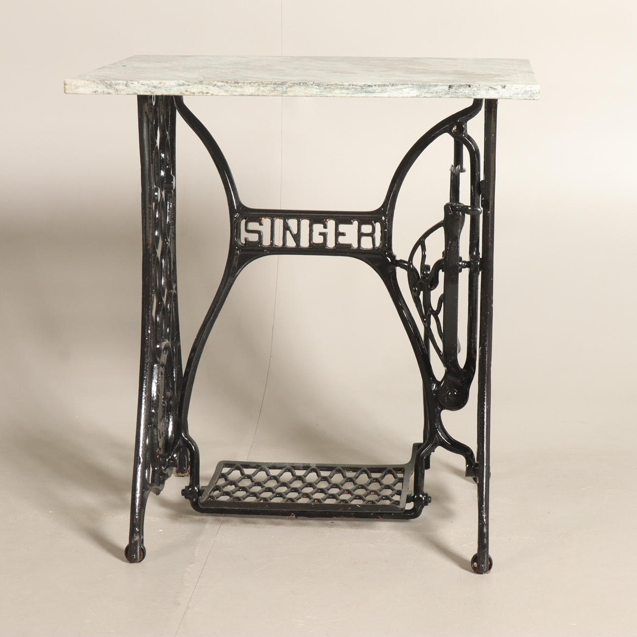 SEWING MACHINE BASE WITH STONE TOP.