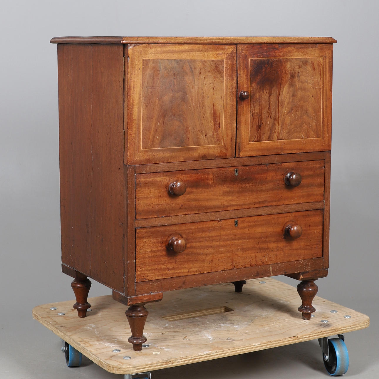 A 19TH CENTURY MAHOGANY POT CUPBOARD.