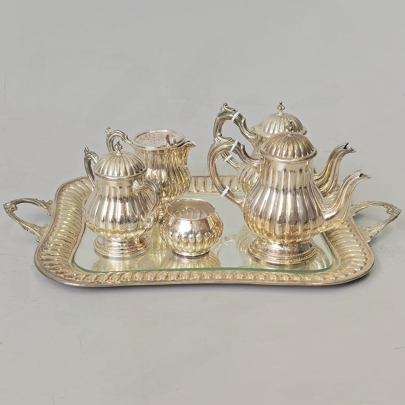 COFFEE SET IN PUNCHED SILVER.