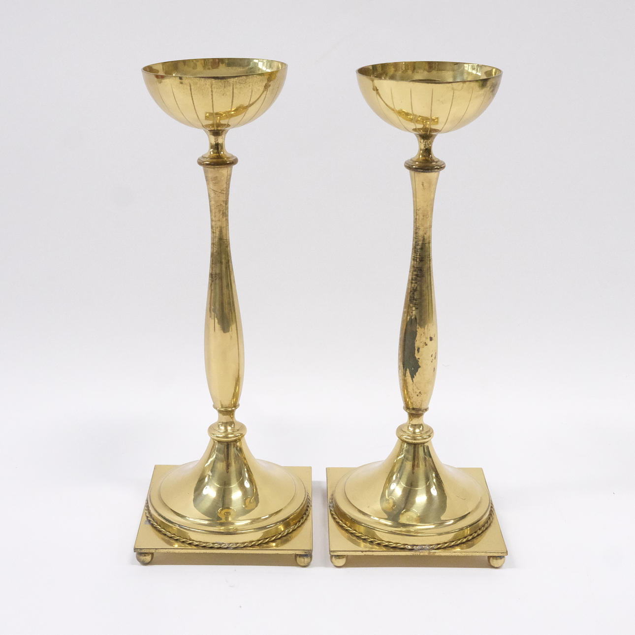 GUNNAR ANDER. YSTAD BRONZE, 1 PAIR OF BRASS CANDLESTICKS.