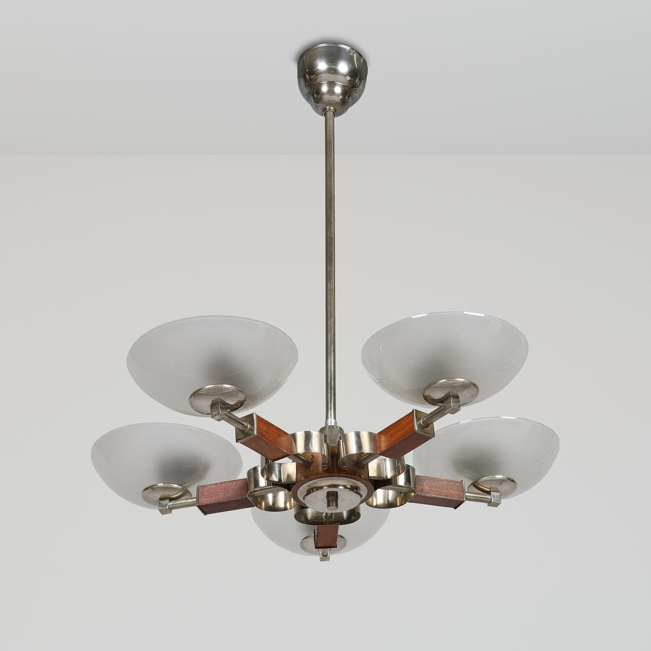 FOG & MØRUP. Attributed to. five-armed chandelier of metal and stained wood, Scandinavian lamp manufacturer, second half of the 20th century.