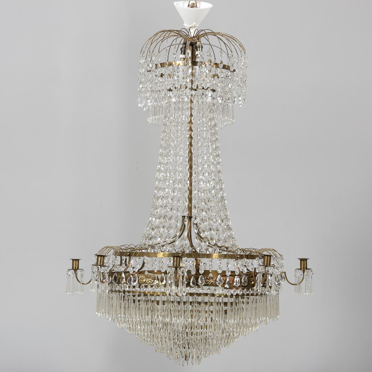 An empire-style chandelier, electrified.