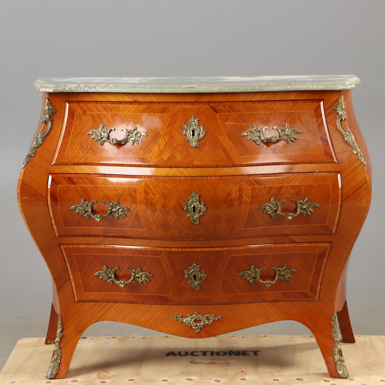 Chest of drawers, 3-drawer, mahogany with stone top and bronzes, rococo style.