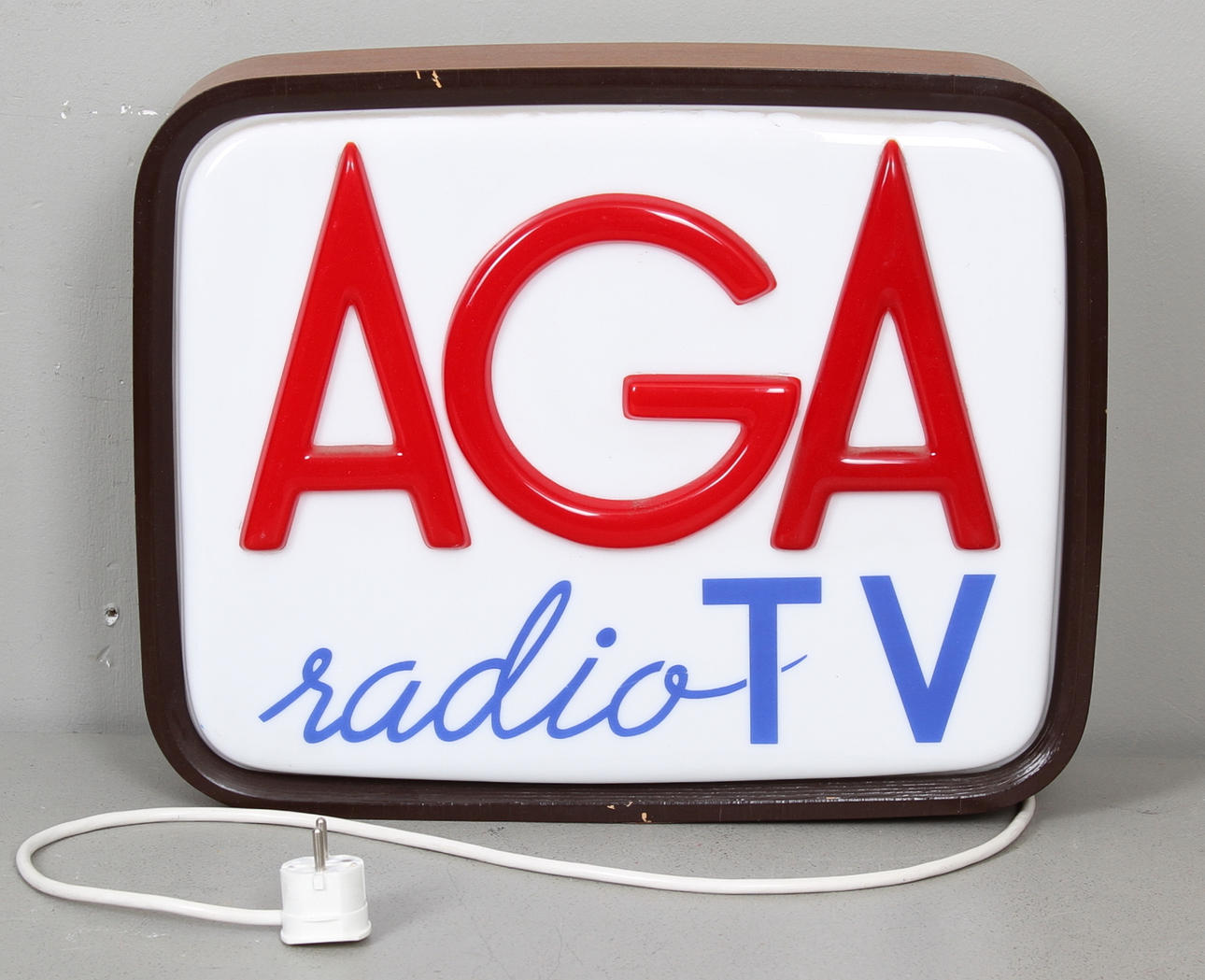 SKYLT MED BELYSNING, AGA radio och tv, 1960 tal.