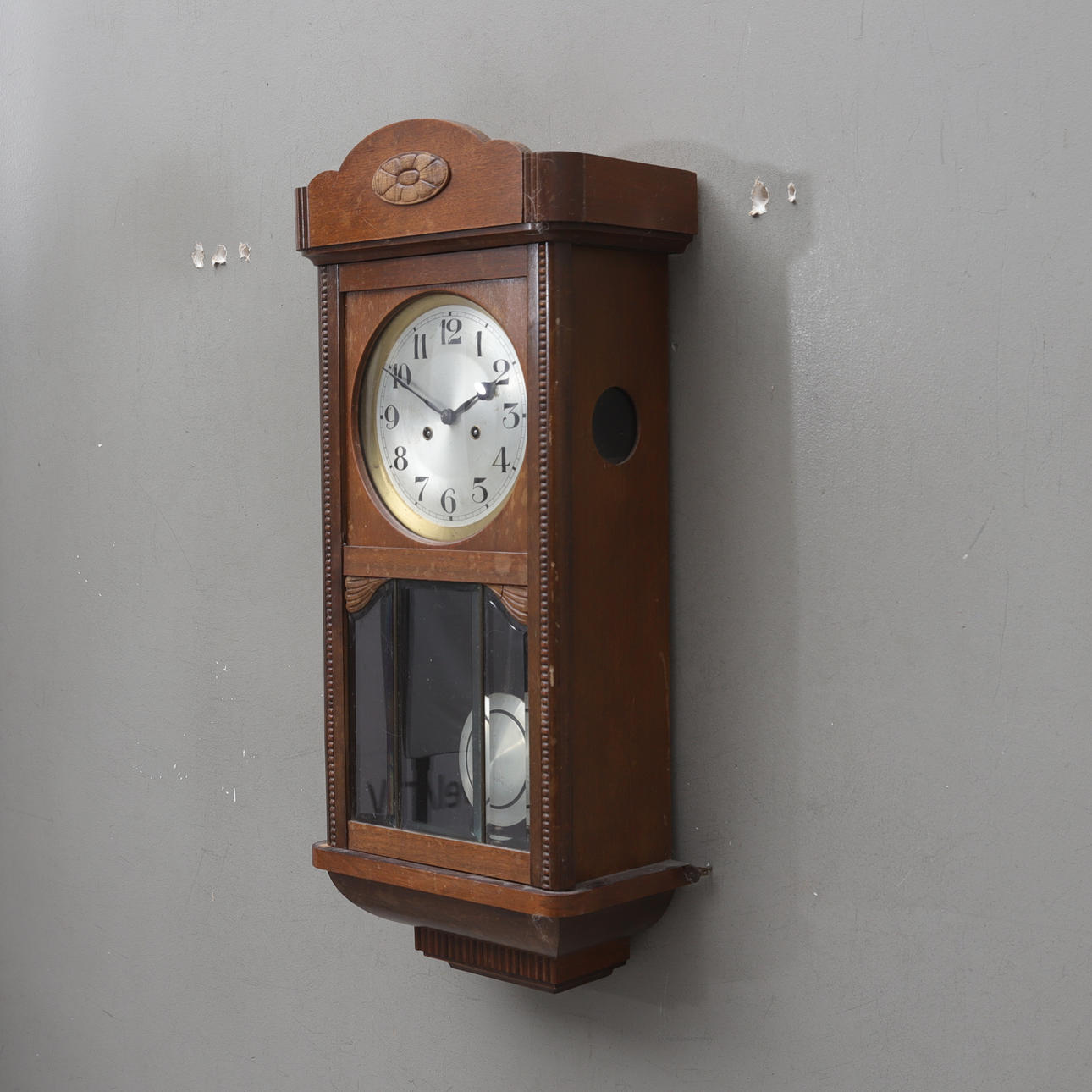 A wall clock by Gustav Becker, Germany, 1920s.