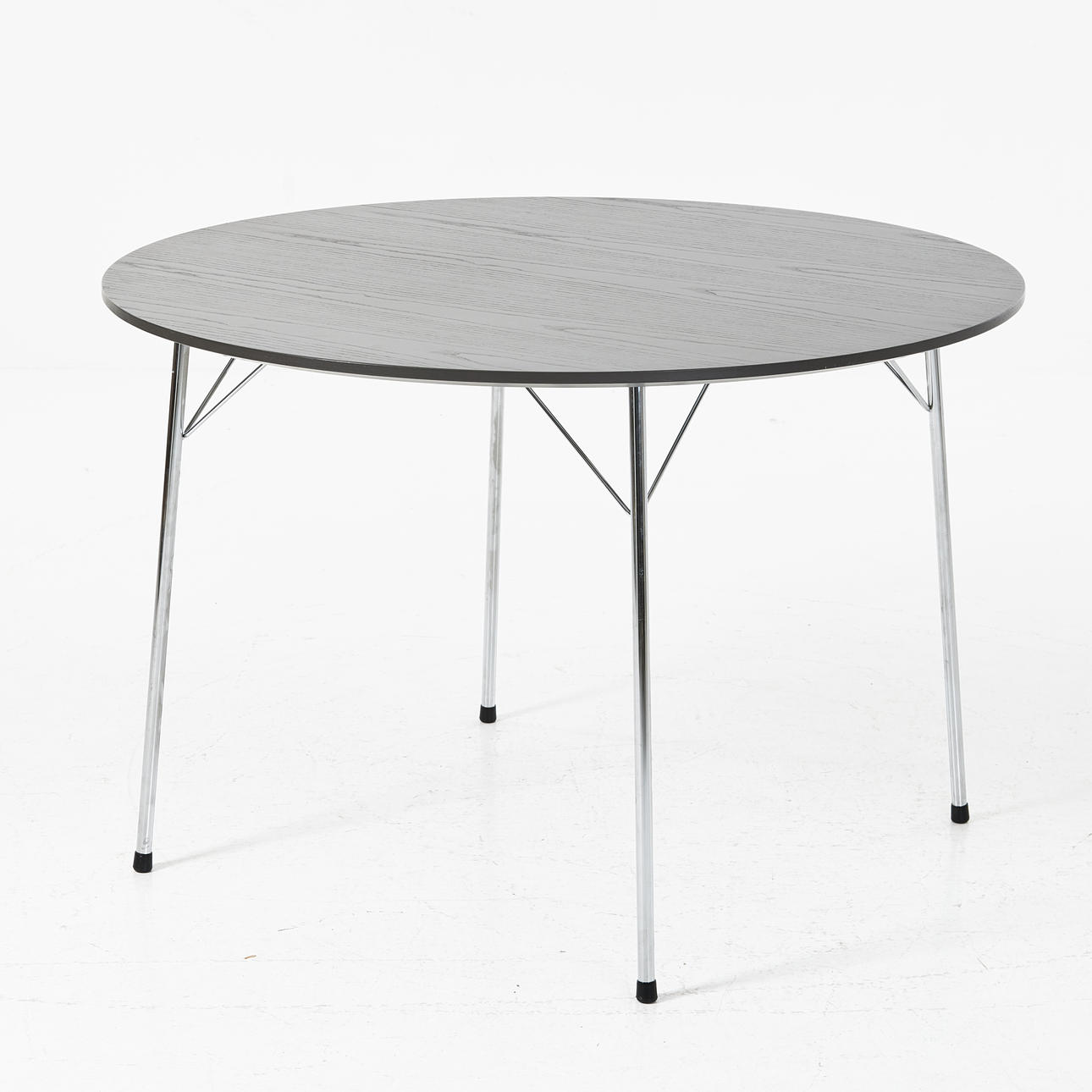 ARNE JACOBSEN. Dining table, Fritz Hansen, Denmark, black lacquered table top, chromed legs.