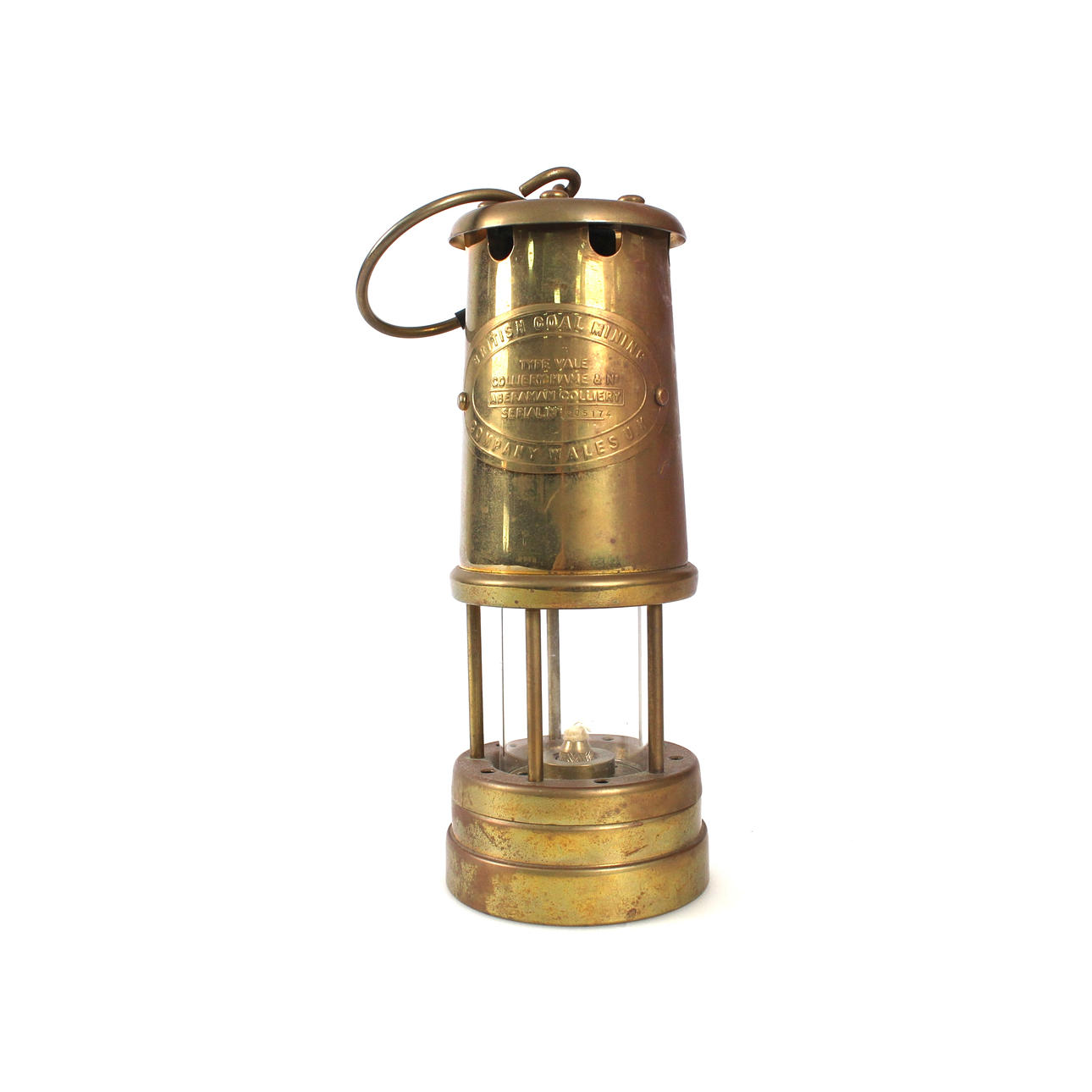 A brass mining lantern, British Coal Mining Company, Wales.