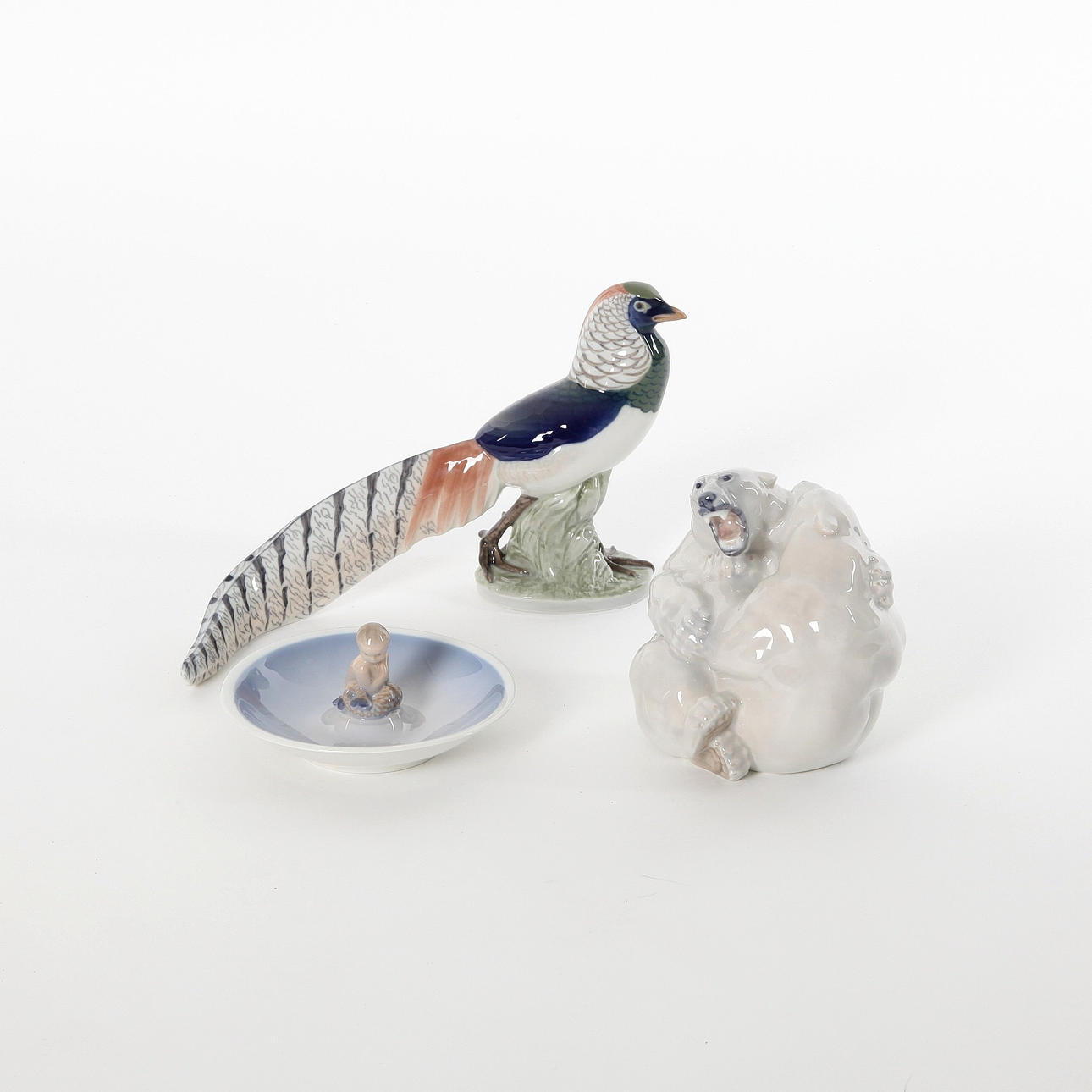 A set of 3 figurines, pheasant no 1881, polar bears no 2317 and mermaid no 3231, Royal Copenhagen, Denmark, 1970s.
