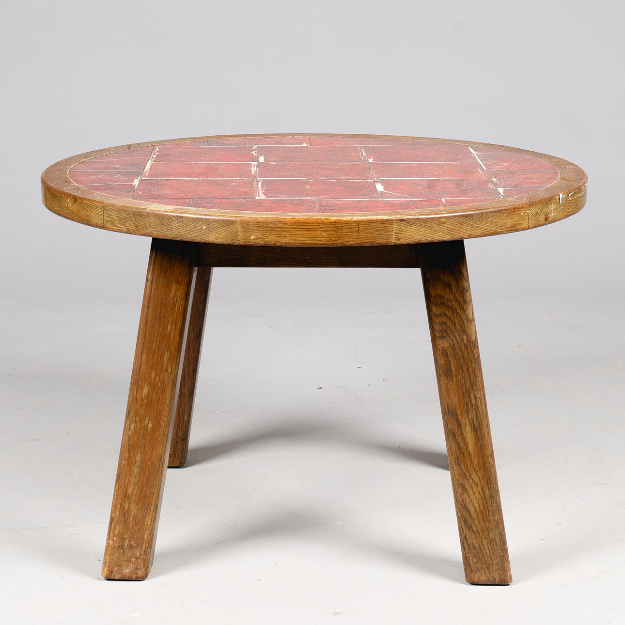 Circular coffee table made of solid oak, top with tiles, Danish cabinetmaker, Denmark, 1900s.