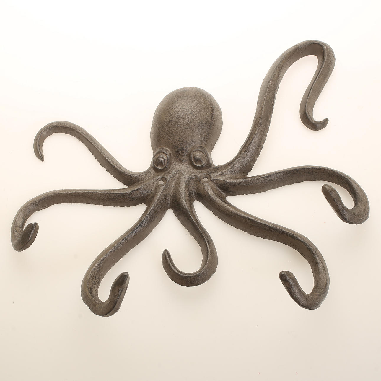 KLEIDERBÜGEL, IN FORM EINES OKTOPUS, AUS GUSSEISEN, MODERN.