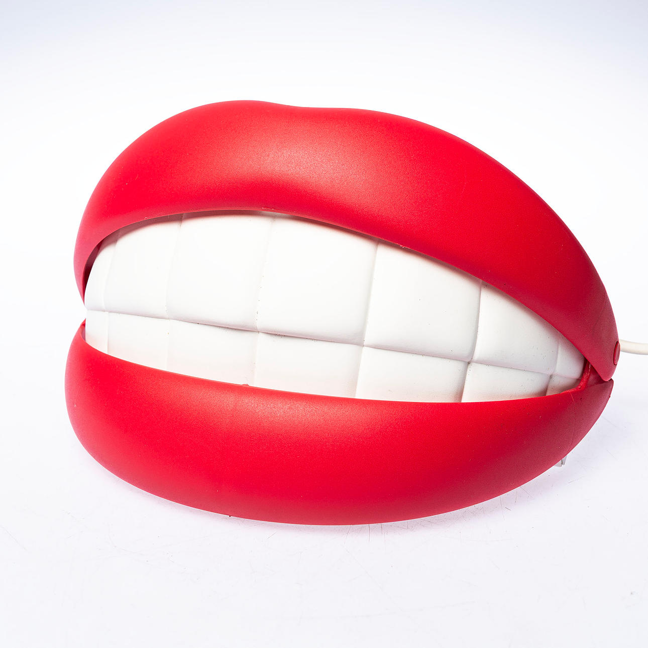 A plastic wall lamp, “Flabb”, IKEA, 2003.