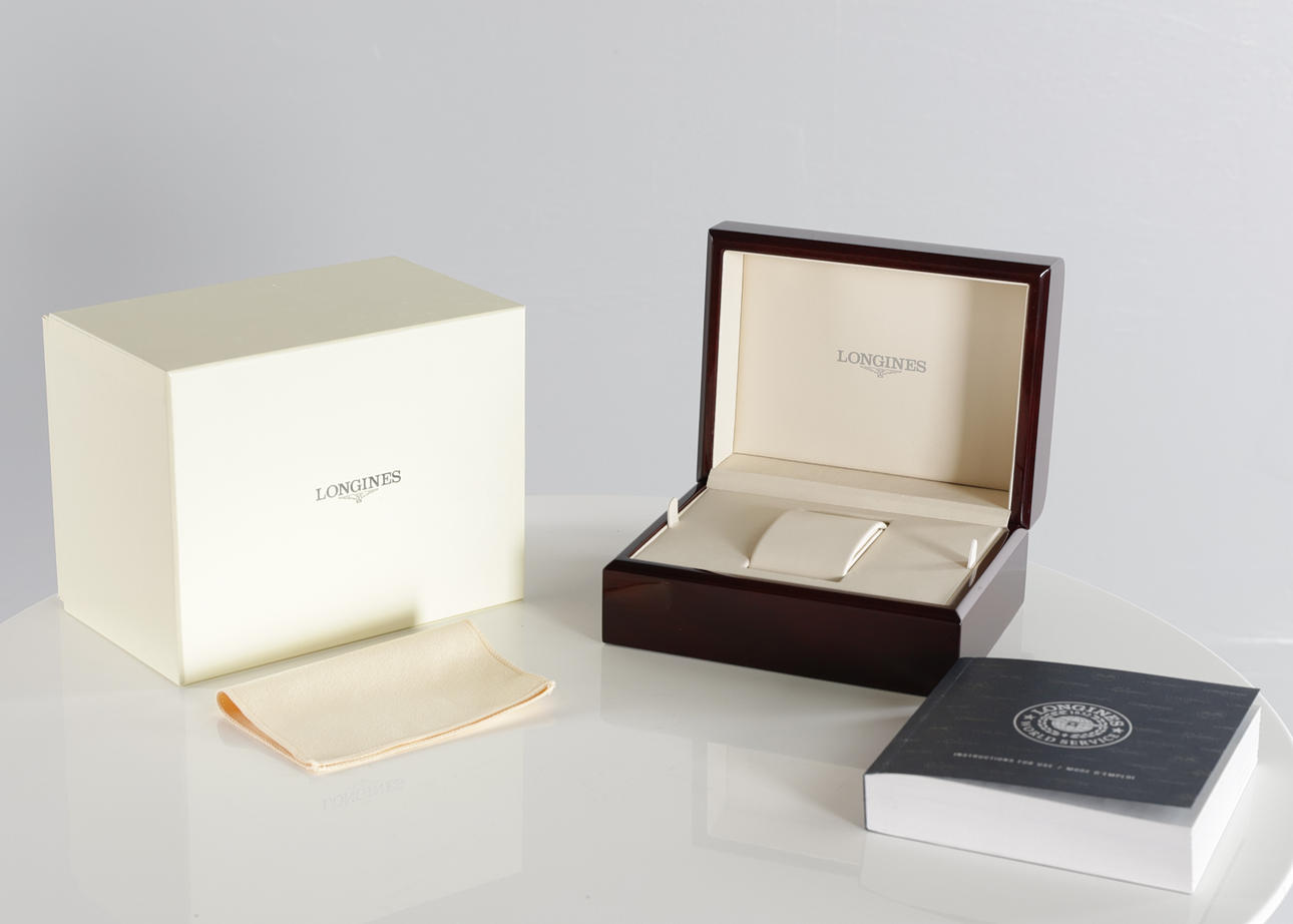 LONGINES. Inside/ as well as outer box with accompanying manual, dust cloth, etc.