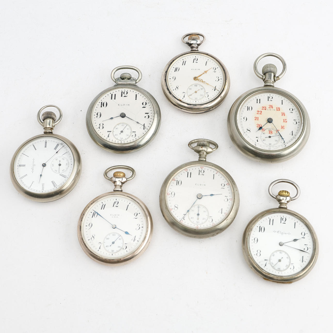 ELGIN, 7 st taskukelloja, varav 2 hopeaa ja 5 hopeaa, ca 1900.