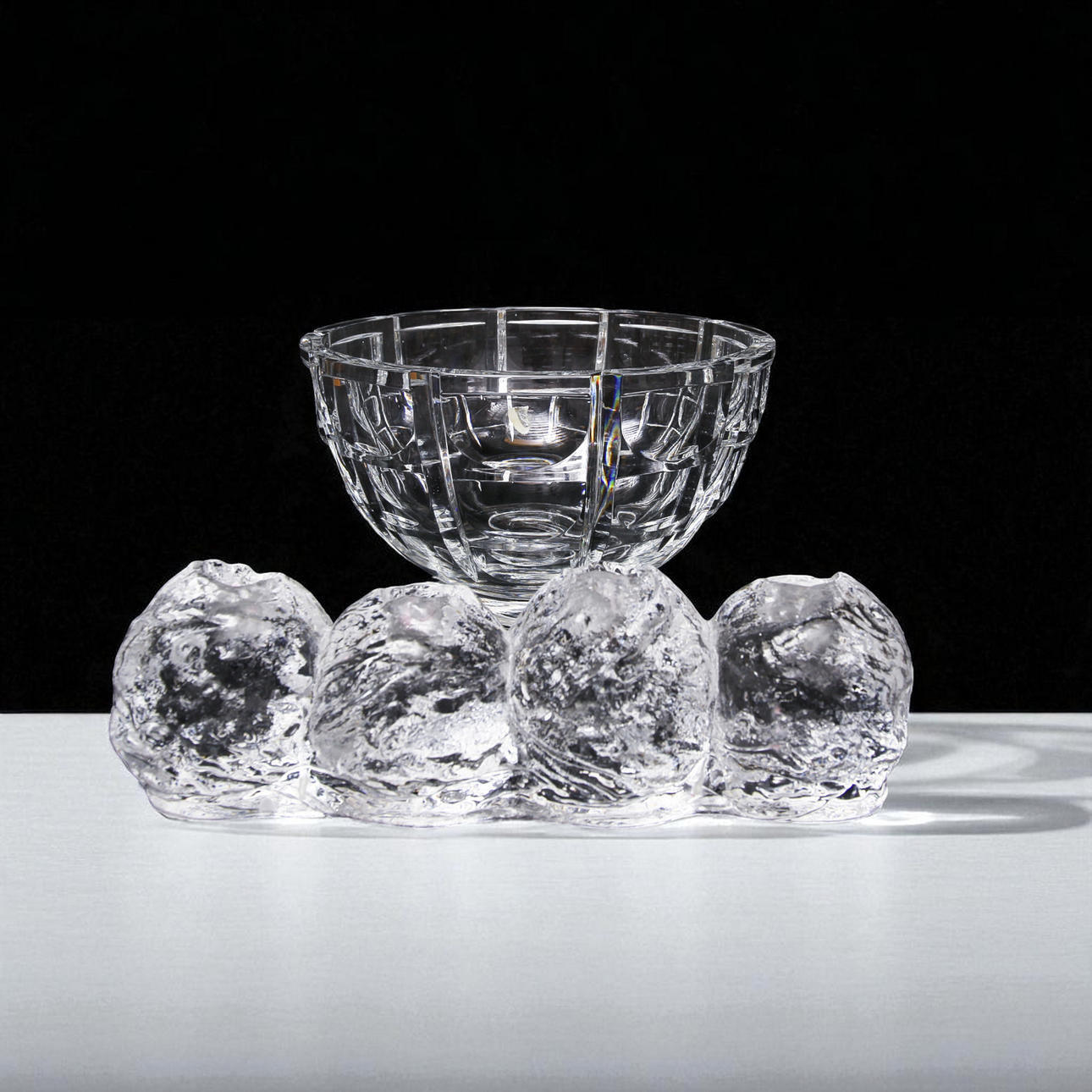 VASE, crystal, “Thousand Windows” Simon Gate Orrefors and CANDLESTICK snowball.