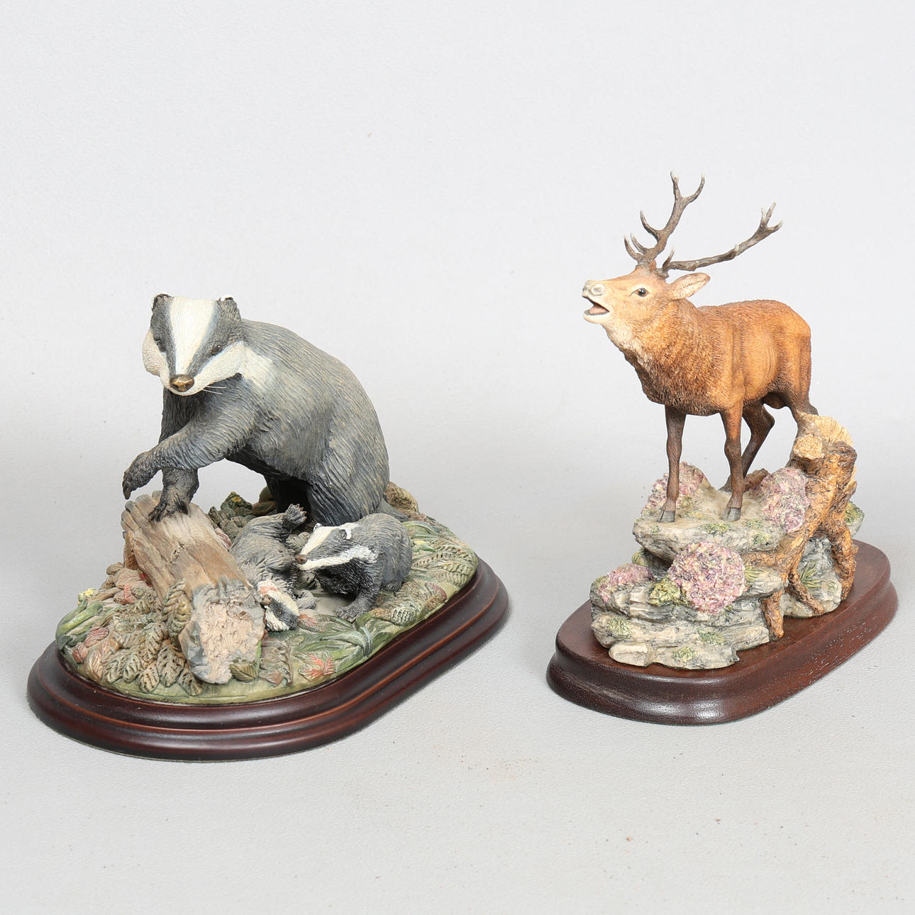 BORDER FINE ARTS RED STAG AND BALLANTYNES BADGER SCULPURES (2).